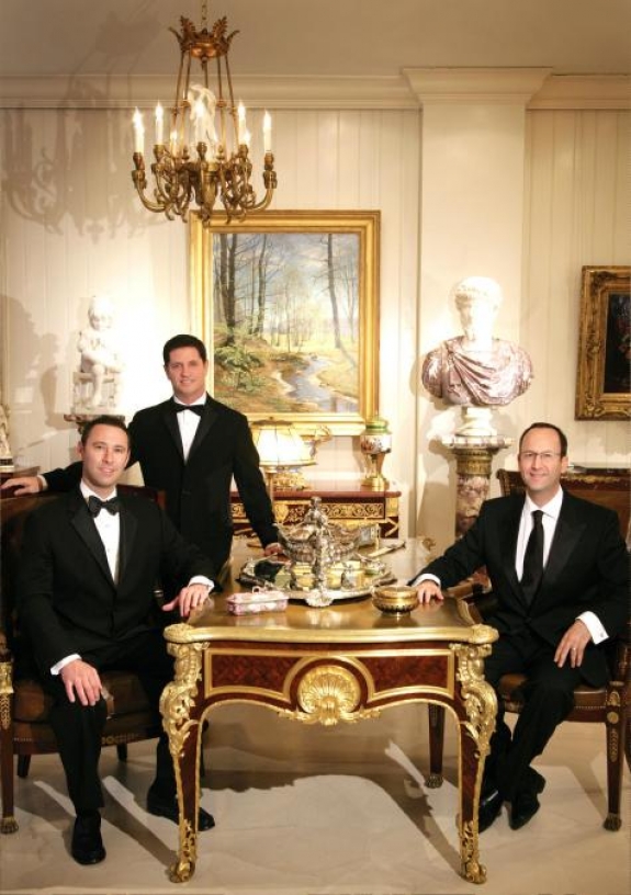 Palm Beach Show Group partners Scott Diament, seated left, Kris Charamonde and Rob Samuels founded the Palm Beach Jewelry, Art &amp; Antique Show in 2004. 