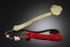 A yellow jade scepter associated with the court of the Qianlong emperor. The 14-inch-long ``ruyi,&#039;&#039; acquired by a British military attache in Beijing during the Boxer Rebellion of 1900, was sale by Bonhams in London on May 12, 2011.