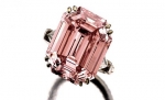 A &quot;fancy intense pink&quot; diamond sold for 9.6 million francs ($10.9 million) including fees in Sotheby&#039;s auction of jewels in Geneva on May 17. The emerald-cut stone weighs 10.99 carats and had not been on the market for 30 years.