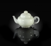 An 18th-century Qianlong dynasty Imperial white jade teapot and cover. It was offered by the Salisbury auction house Woolley &amp; Wallis on May 18 and was described as having been acquired by a Scottish collector in the 1880s. It sold to a Hong Kong-based telephone bidder for 2.1 million pounds. 