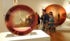 Frederick Eversley&#039;s untitled work, left, and &quot;Red Concave Circle&quot; by De Wain Valentine, right, at the Getty Museum in Los Angeles, part of the massive Pacific Standard Time art festival.