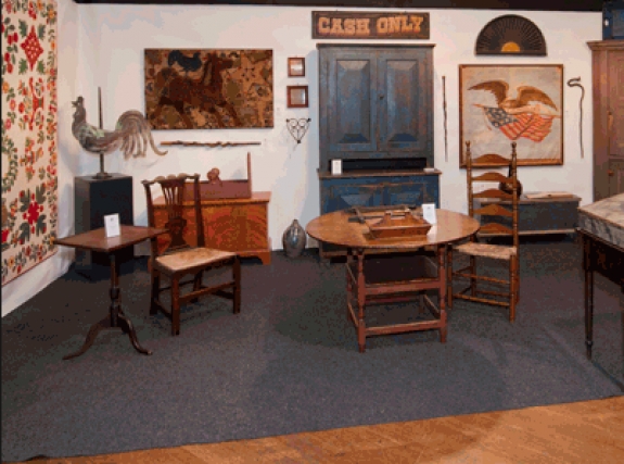 A booth at a previous edition of the New Hampshire Antiques Show.