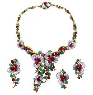    18 Karat Gold, Platinum, Cabochon Burma Ruby, Emerald and Diamond Suite by Mauboussin, Paris, 1962 and 1965. Offered by J.S. Fearnley.