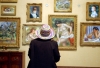 A visitor admires works at the eclectic Barnes Foundation