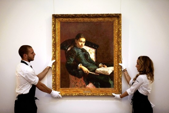Handling &#039;Portrait of the Artist&#039;s Wife, Vera Repin&#039; at Sotheby&#039;s London.