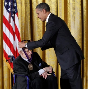President Barack Obama presents a 2011 National Medal of the Arts to painter, print rmaker, and teacher, Will Barnet, Monday, Feb., 13, 2012, during a ceremony in the East Room of the White House in Washington.