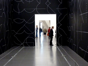 A wall drawing by Sol Lewitt will greet visitors.