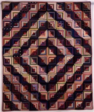 A quilt titled &quot;Log Cabin, variation; Barn Raising,&quot; 1880-1890, by Anna Lay Park that is displayed as part of the &quot;Unfolding Stories: Culture and Tradition in American Quilts,&quot; exhibition at the Fenimore Art Museum in Cooperstown, New York, is shown in this undated handout photo. 
